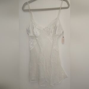 Elegant Ivory Chemise With Irredescent Sequins, Lace Trim, and Side Slit.